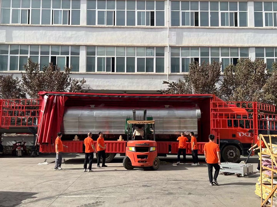 許昌智工八米電磁流水線炒腰果設備裝車發貨 許昌智工八米電磁流水線炒腰果設備裝車發貨